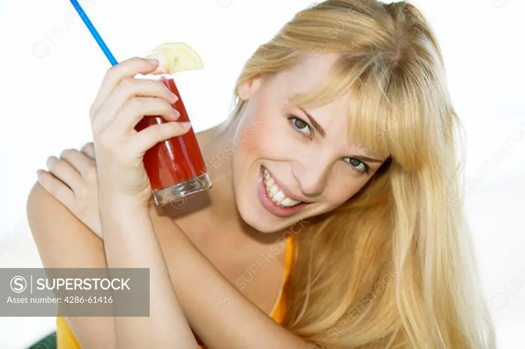 woman having a drink at a beachbar