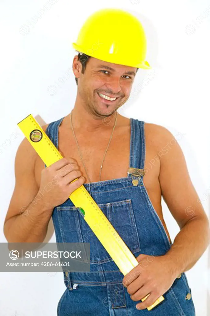 workman with hardhat and level