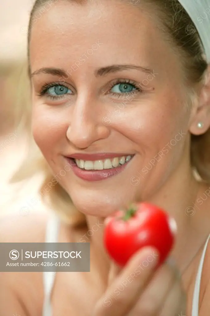 Woman with tomatoes