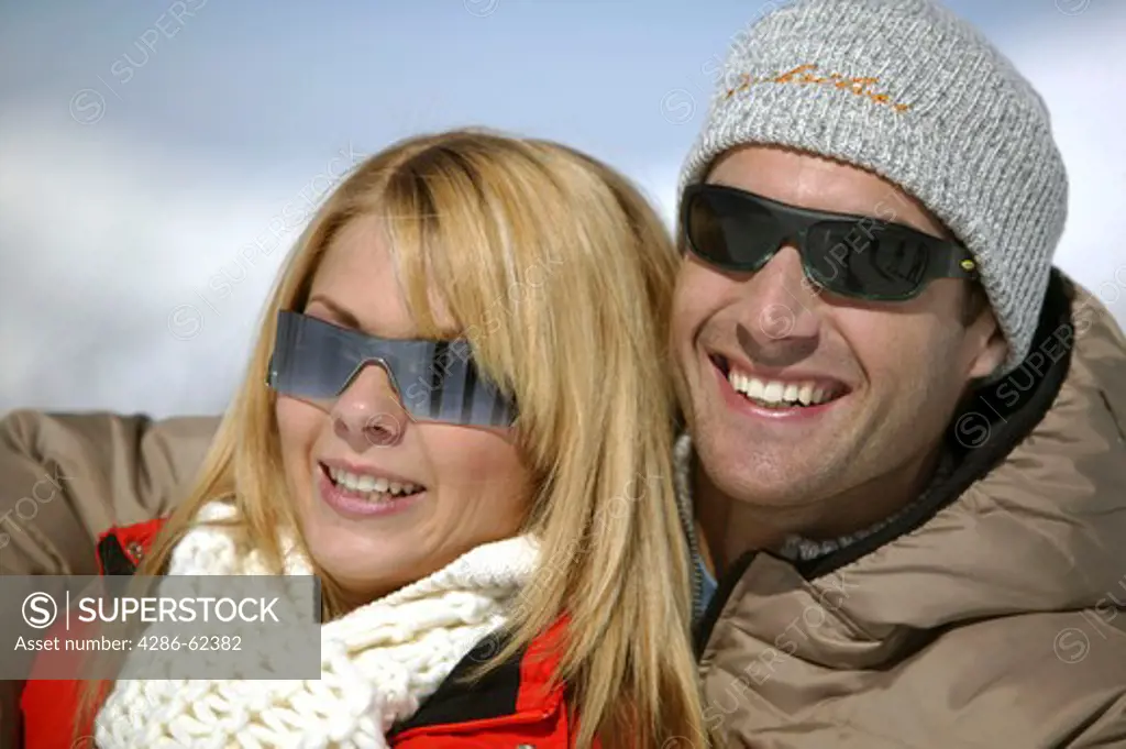 Couple in Love in Mountains Winter Holiday