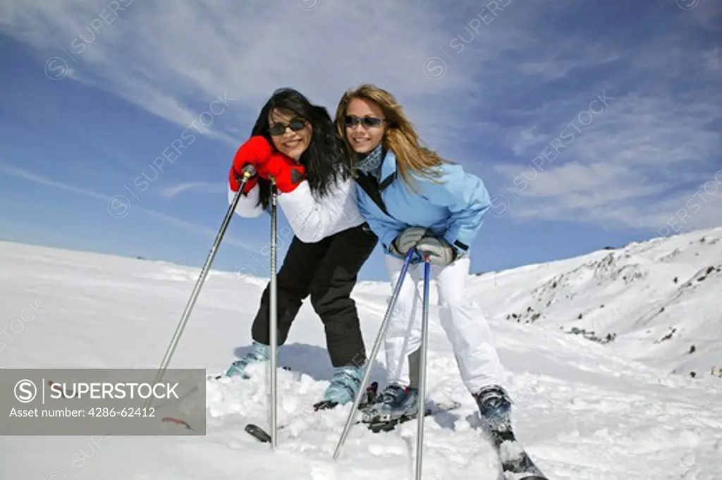 Young Women Skiing Winter Holiday