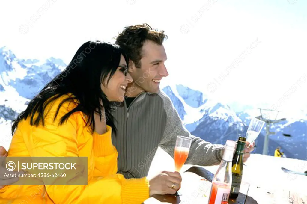 young people at apres ski in winter holiday