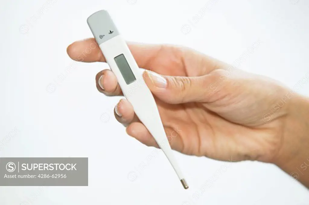 woman with clinical thermometer cold