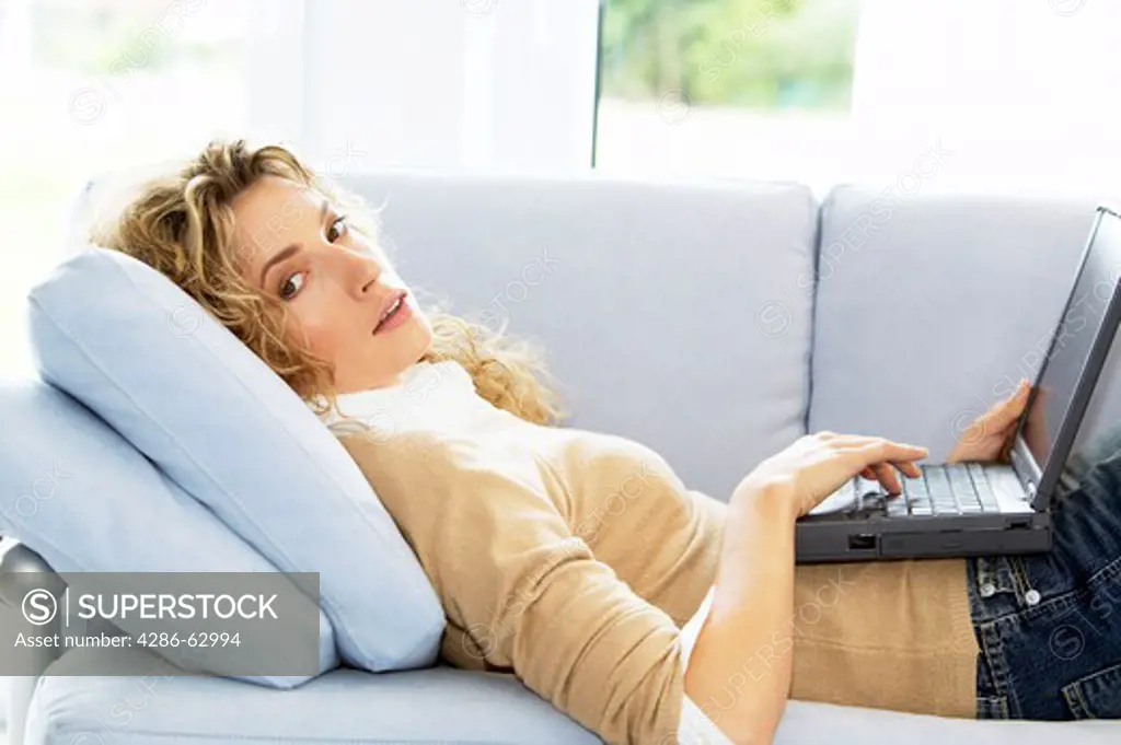 woman working at home with notebook