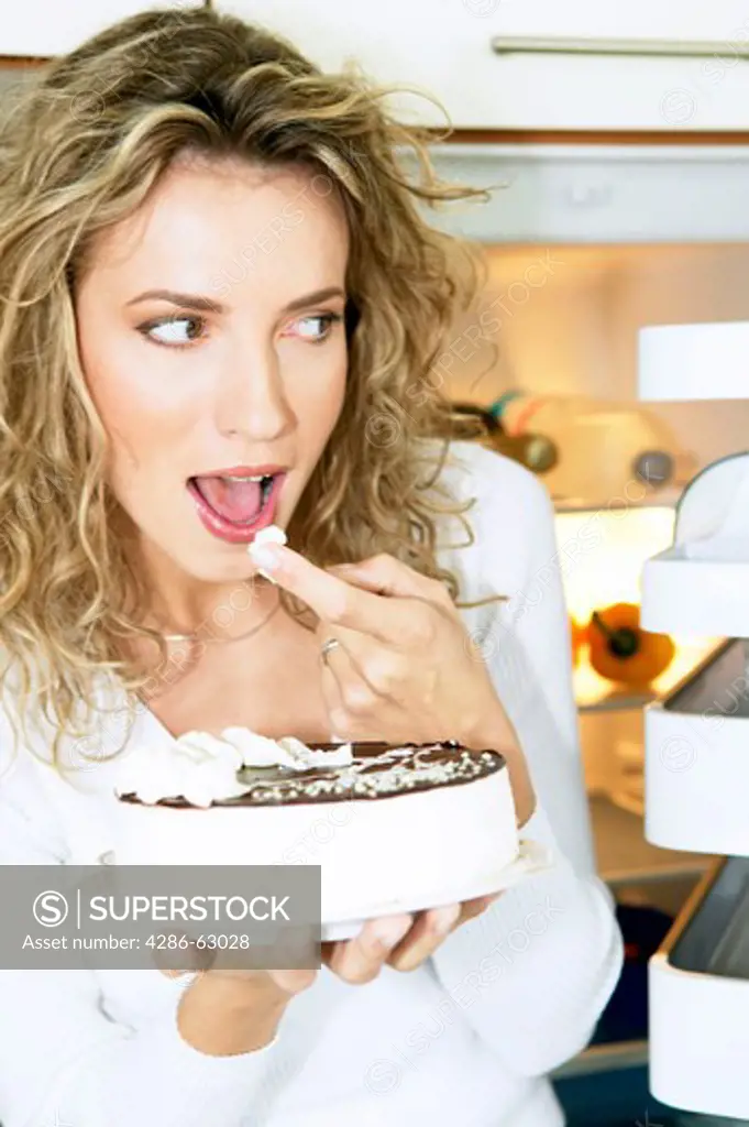 woman eating cake