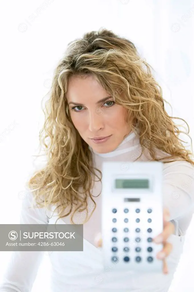 woman showing pocket calcualator