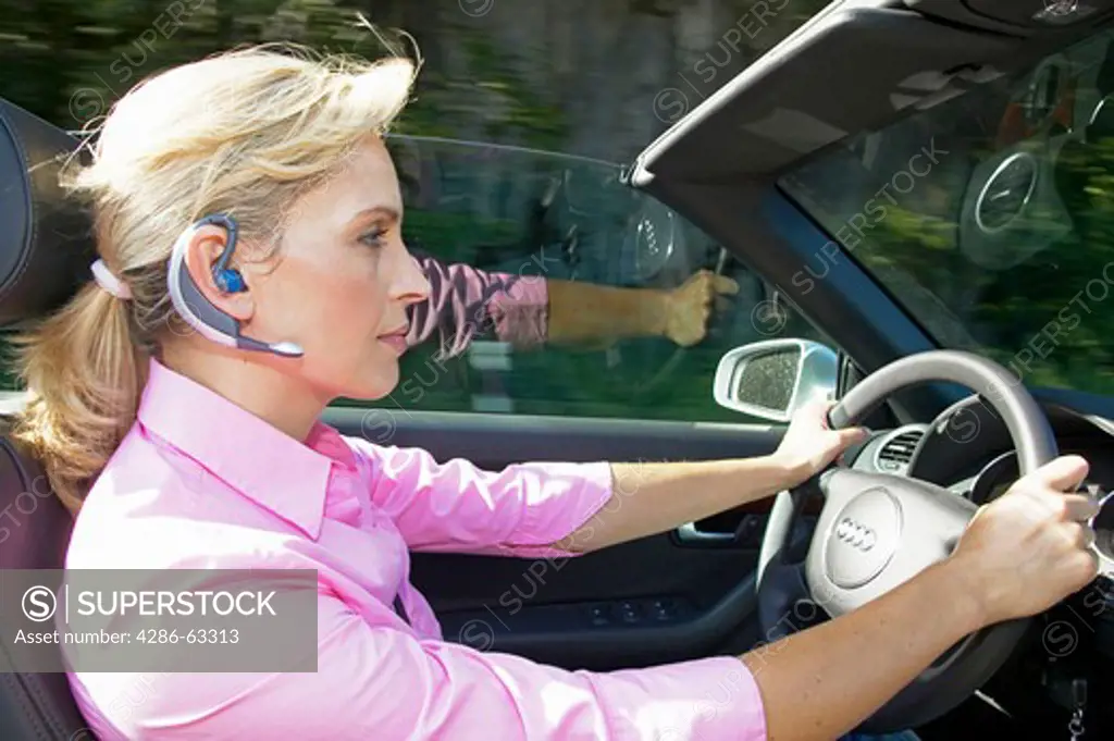 Woman Driving and Phoning