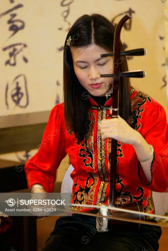 Woman in National Garb from Taiwan Playing the Violin Asian