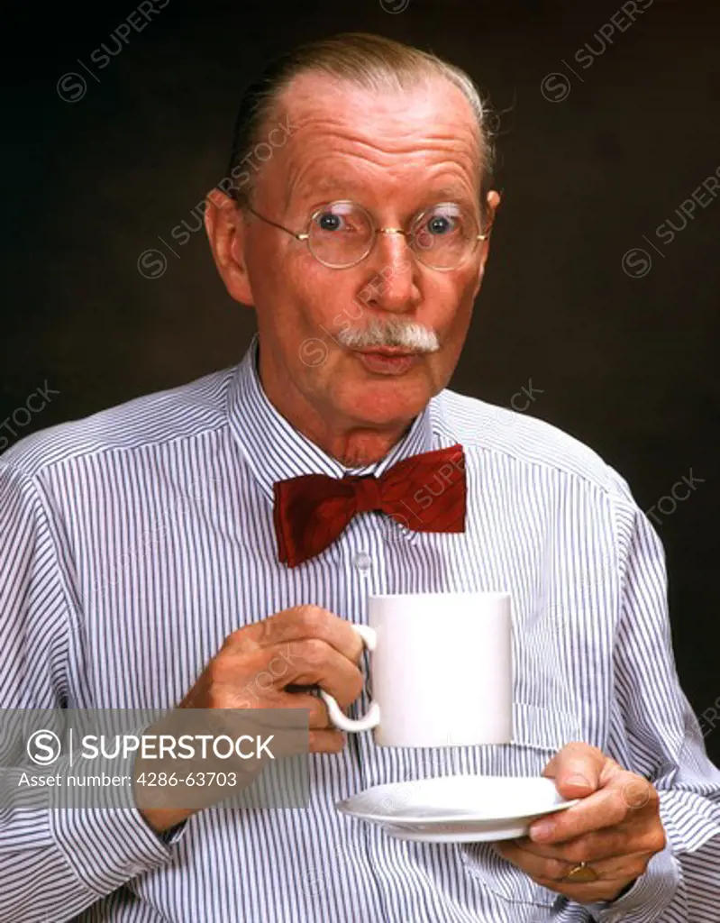 Older man with coffee cup