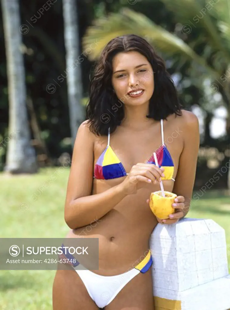 Brazilian woman in Rio de Janeiro with cocktail