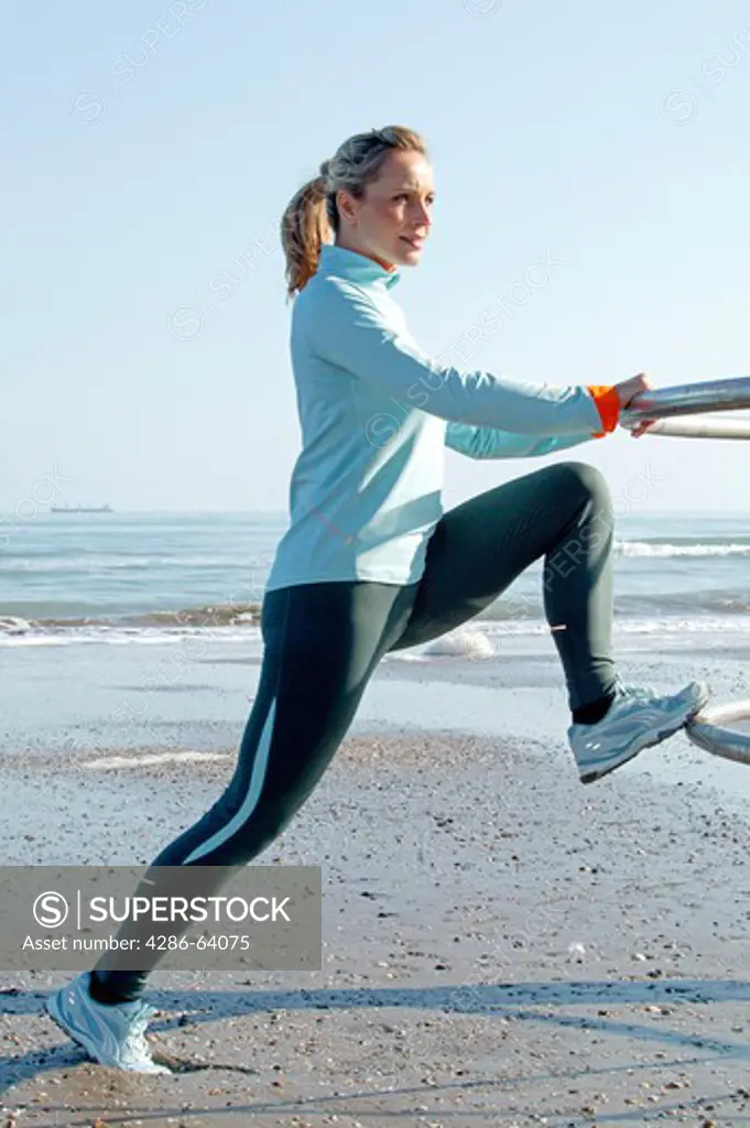 woman jogging at the sea