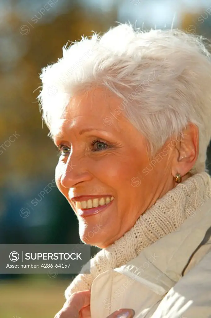 older woman in autumn