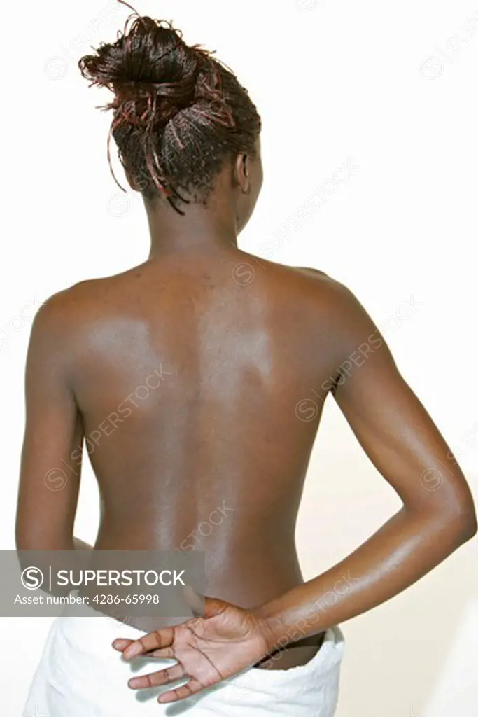 naked back of a swarthy woman