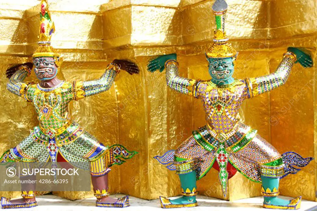 Bangkok figures in gilt Stupas in the Grand Palace