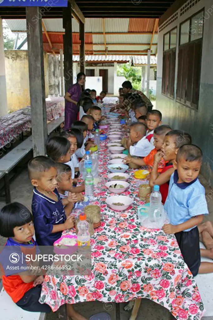 Thai children eating in a School