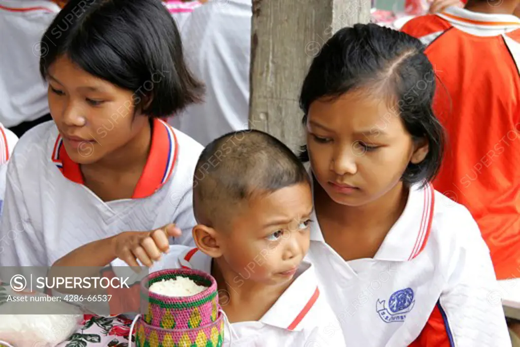 Thai children eating in a School