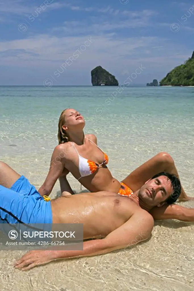 couple in love enjoying holiday on tropical beach in  Krabi