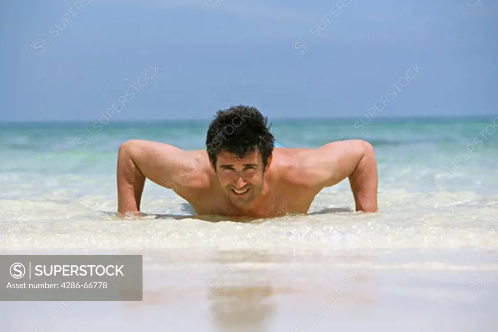 Man enjoying holiday at tropical beach in  Krabi