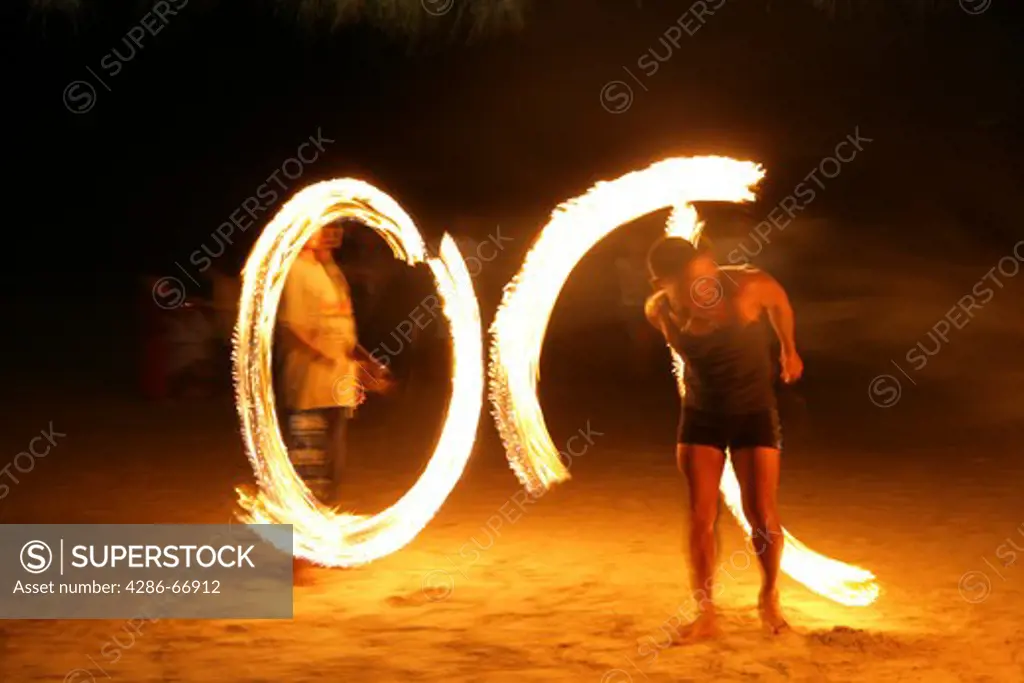 Thai Dancer with Fire on the beach
