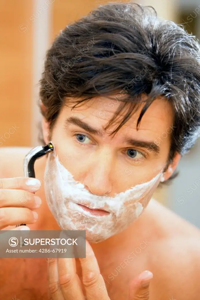 Man shaving portrait