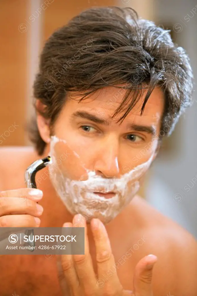 Man shaving portrait