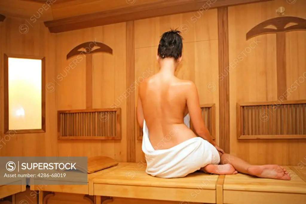 Naked woman  in sauna