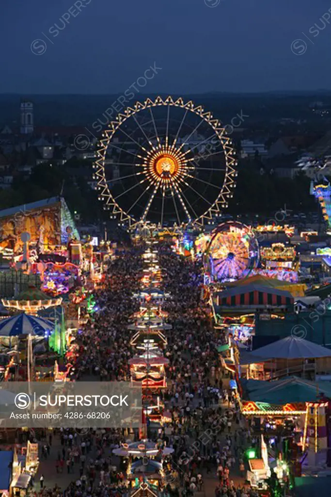Public Festival Oktoberfest in the evening Munich Bavaria Germany
