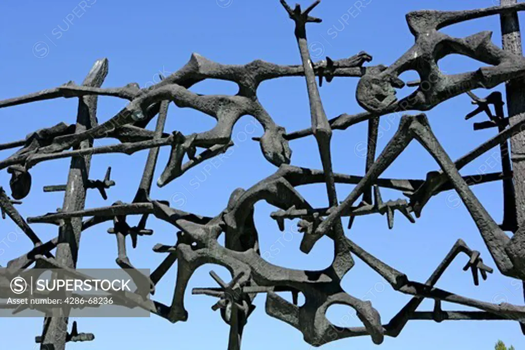Sculpture depicting the twisted bodies of concentration camp victims remembering Dachau Concentration Camp, Munich, Germany