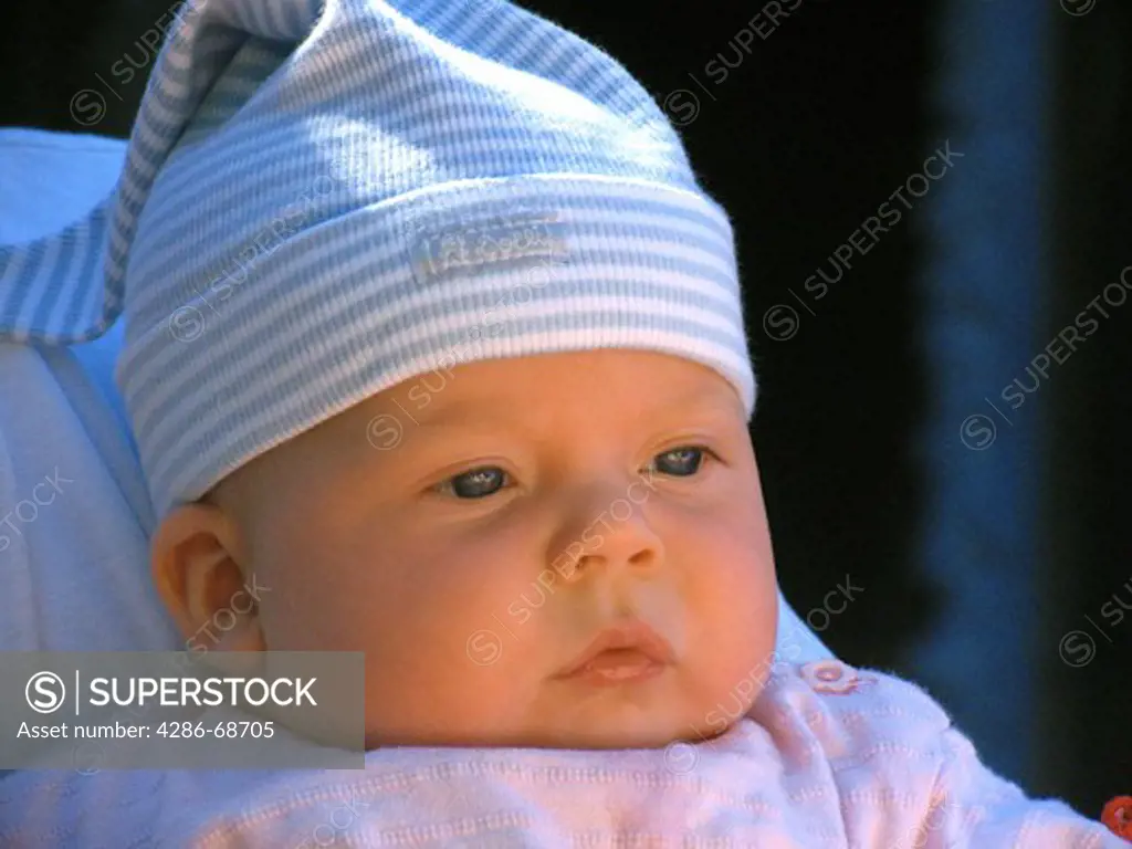 Baby little girl with hat portrait