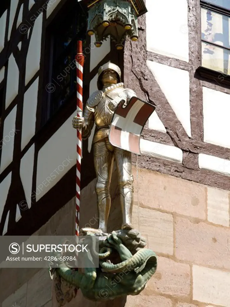 Knight and Dragon on Pilatus House in the old city Nuremberg