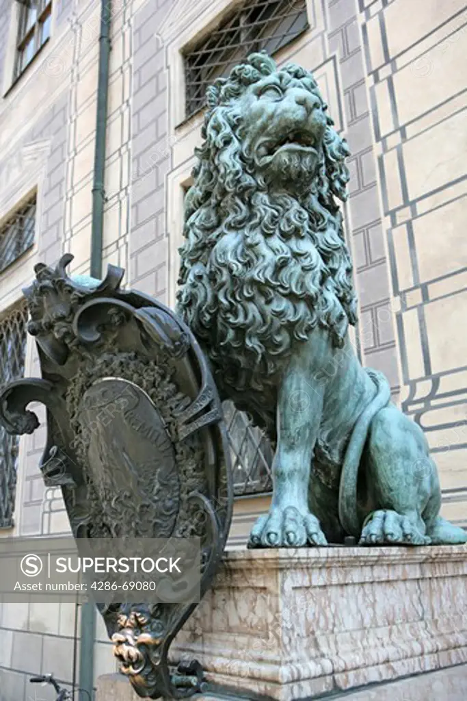 Germany Bavaria Germany, Bavaria, Munich a lion sculpture with shield in front of Residenz Palace near Odeonsplatz