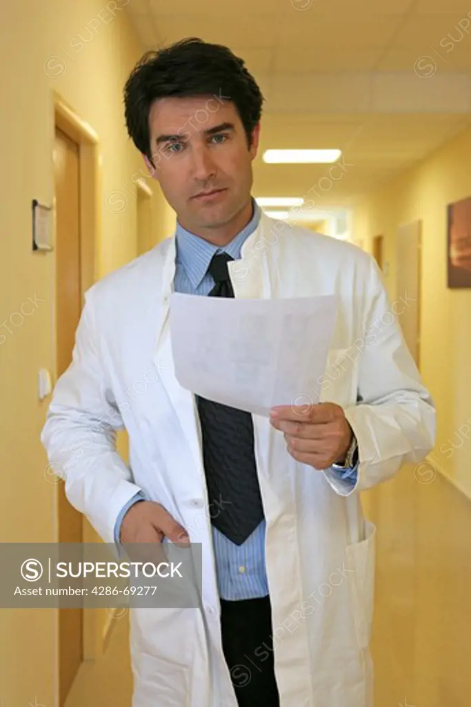 doctor standing in hospital corridor