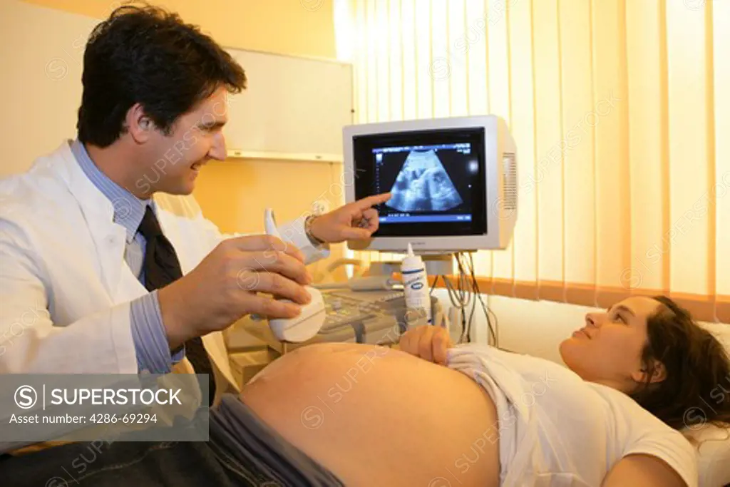pregnant woman getting an ultrasound checkup