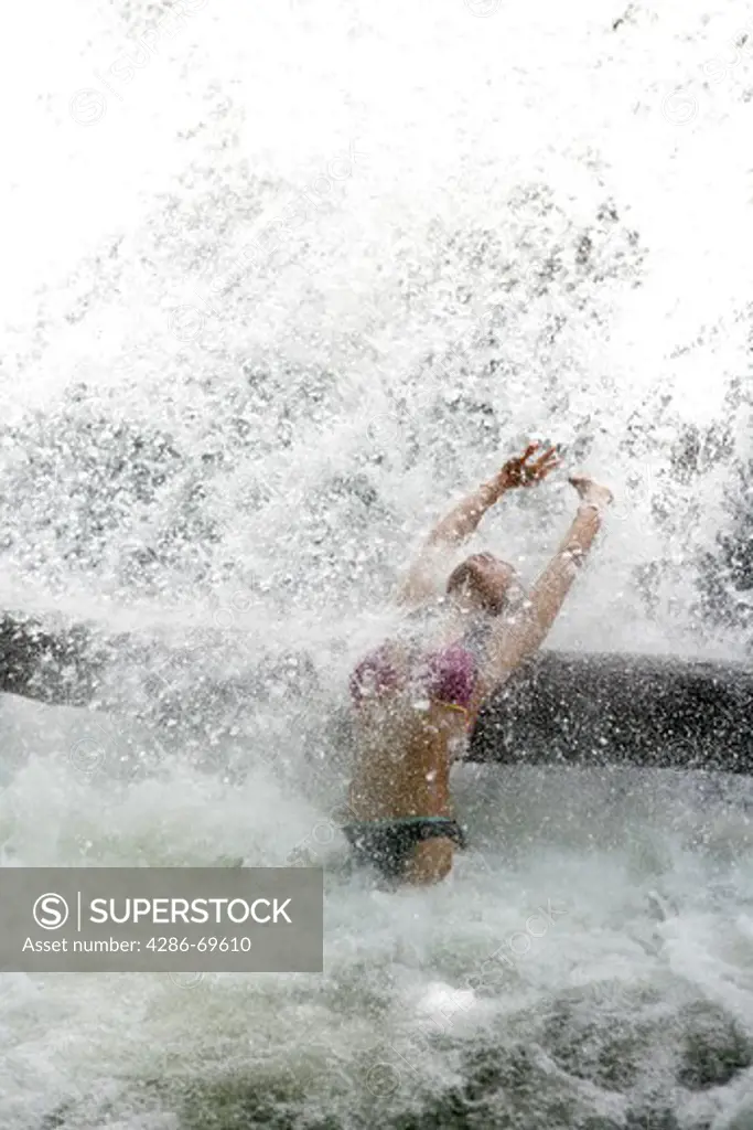 , thai woman refresh on waterfall at Thale Ban National Park