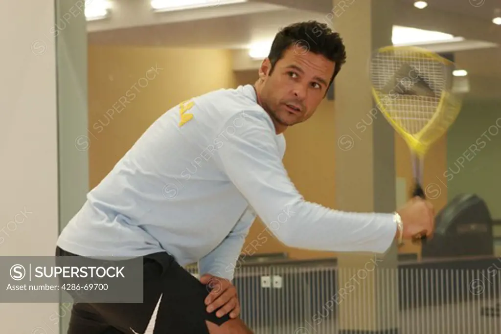 Man plays squash