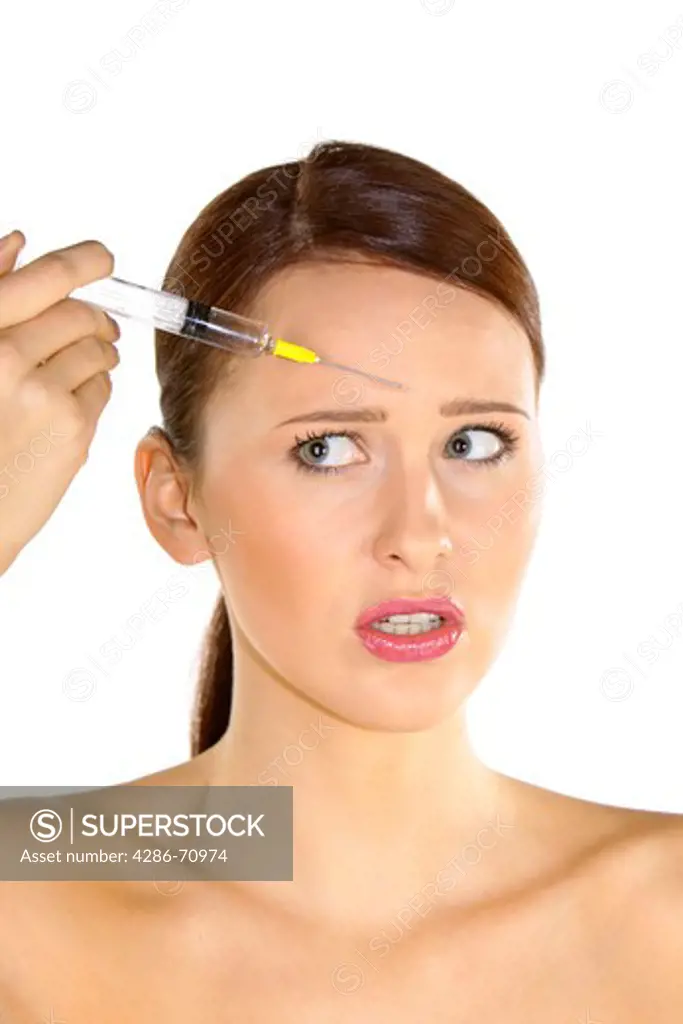 Woman beautycare treatment -  Botox syringe