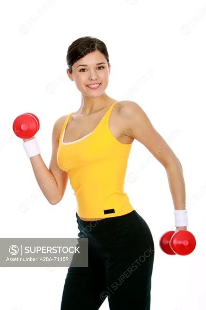 Woman in the fitness training with dumbbells