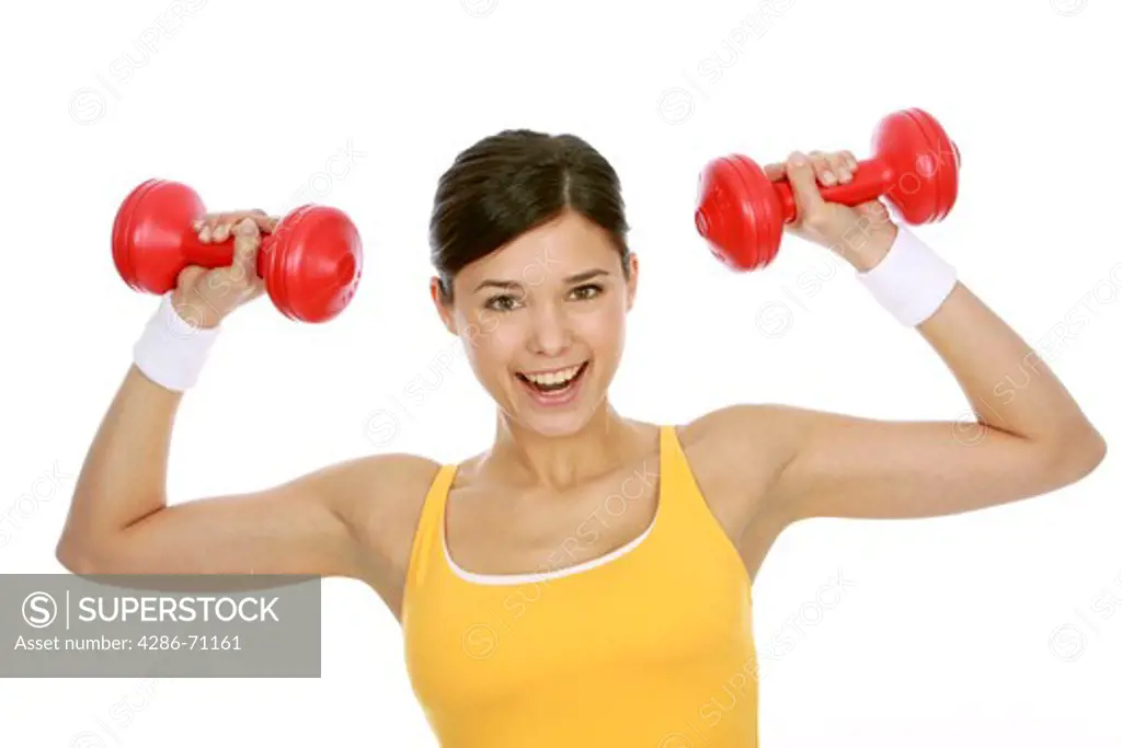 Woman in the fitness training with dumbbells