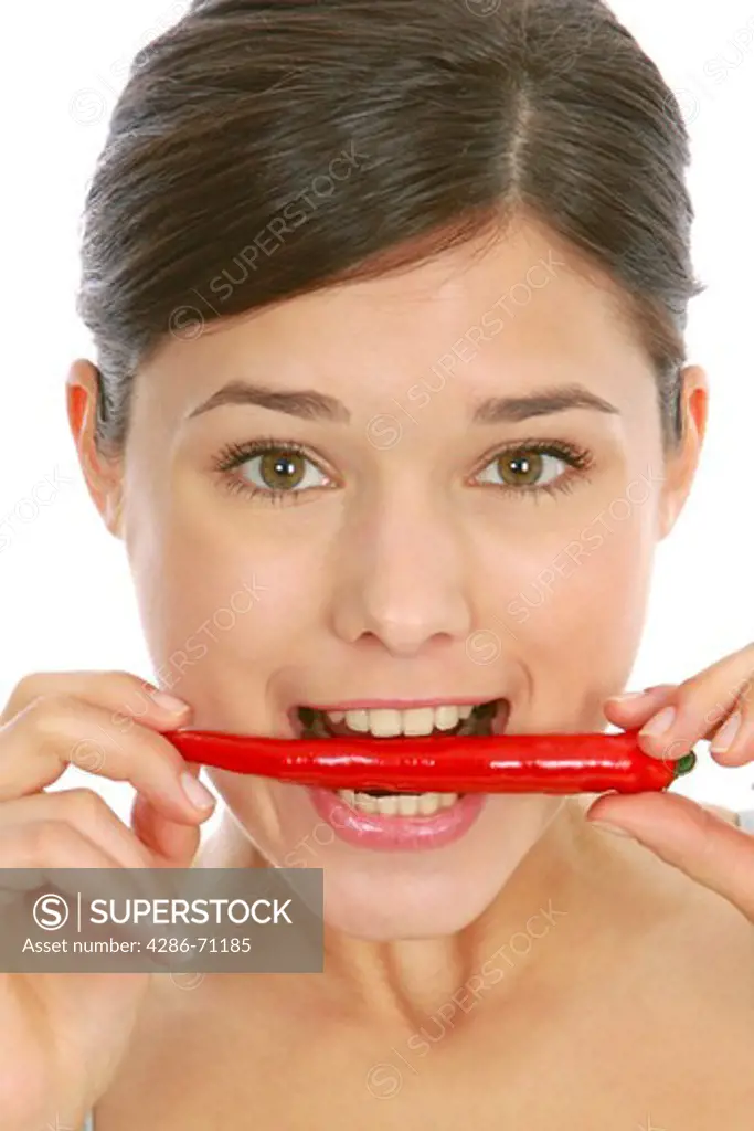 Woman with chilli pod