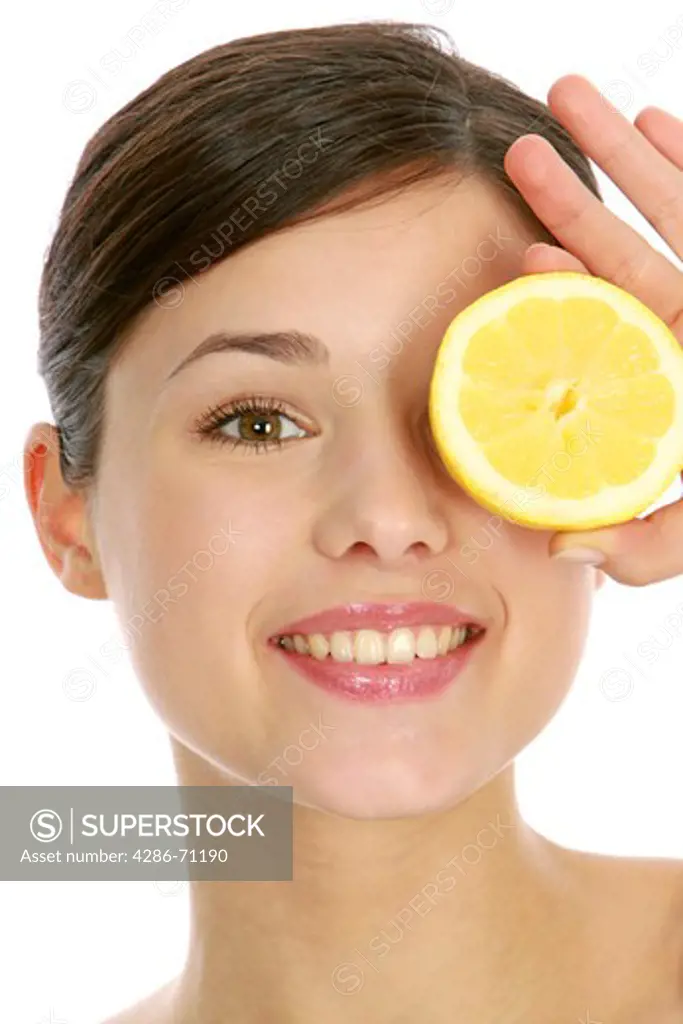 Woman with slices of lemon