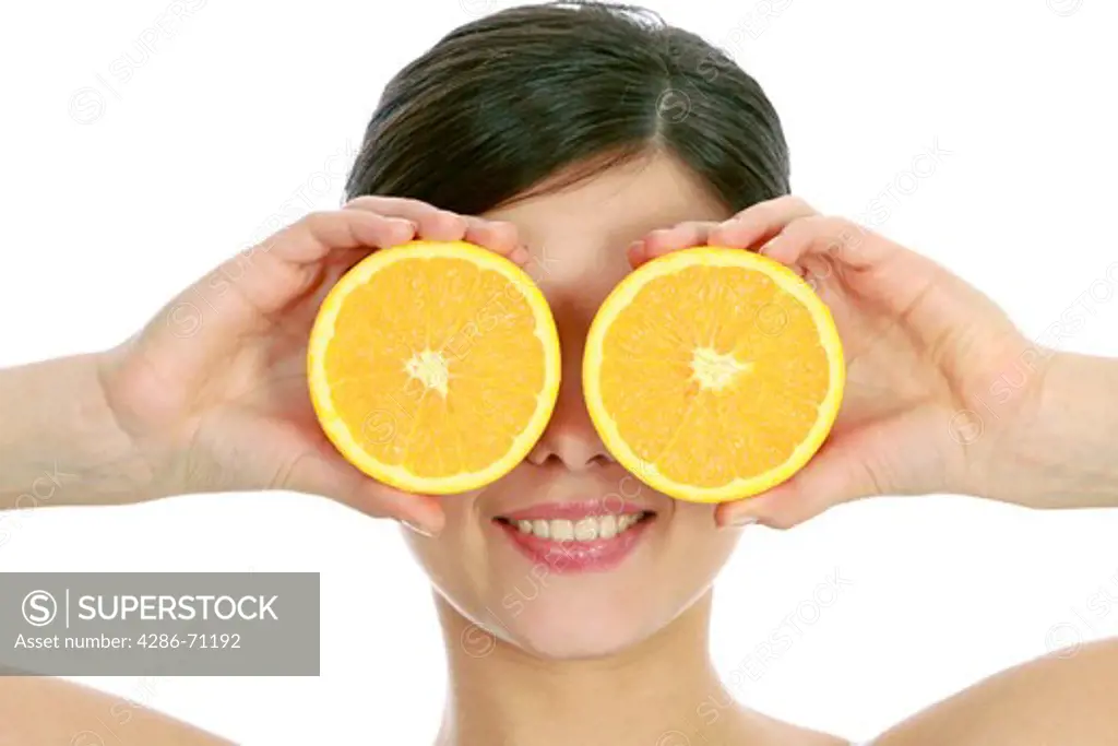 Woman with slices of orange