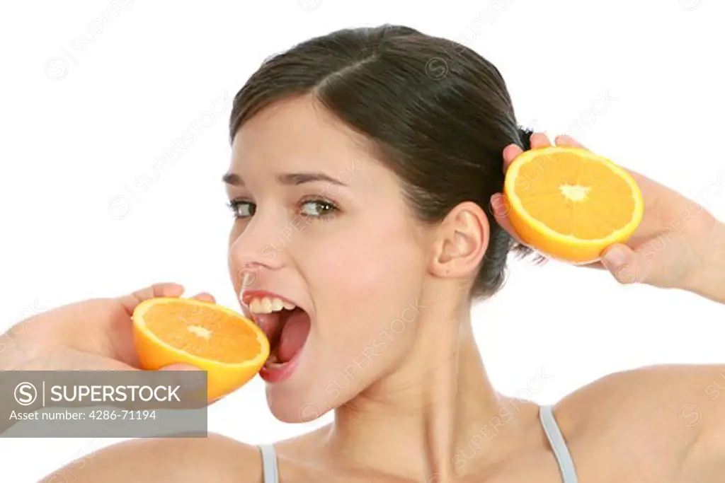 Woman with slices of orange