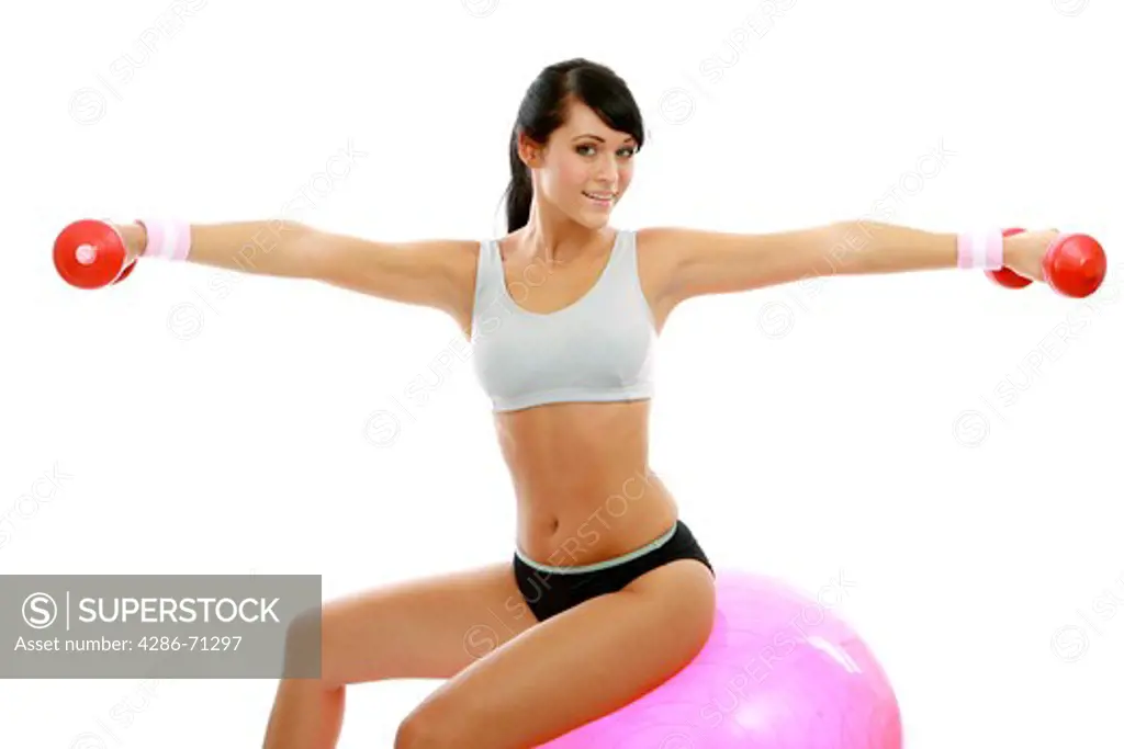 Woman exercising on a fitness ball