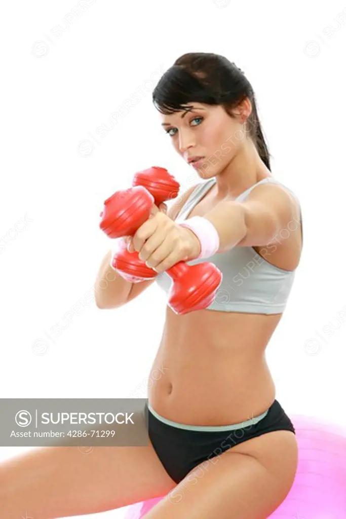 Woman exercising on a fitness ball