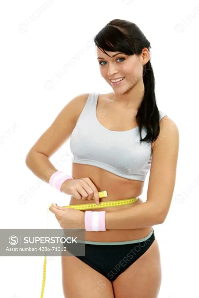 woman measures her belly extent