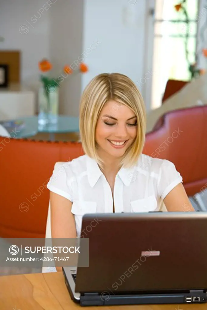 Woman working with a Laptop computer
