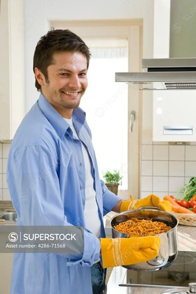 man working in kitchen