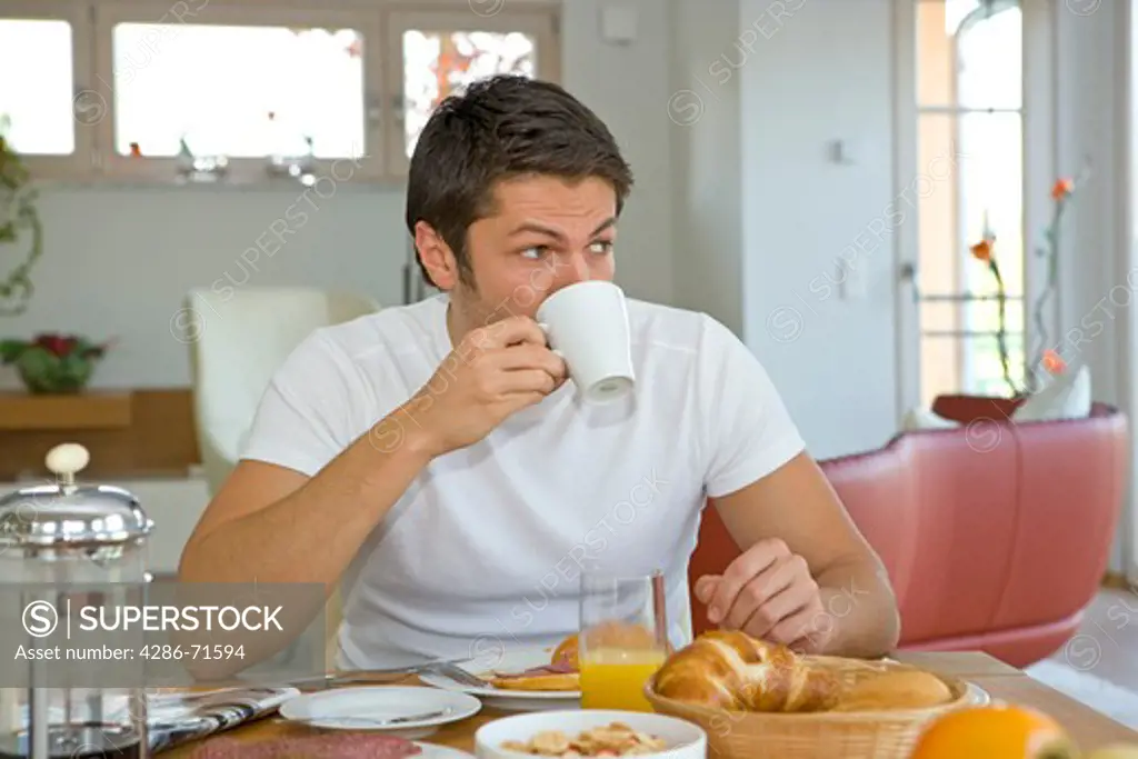 man having breakfast