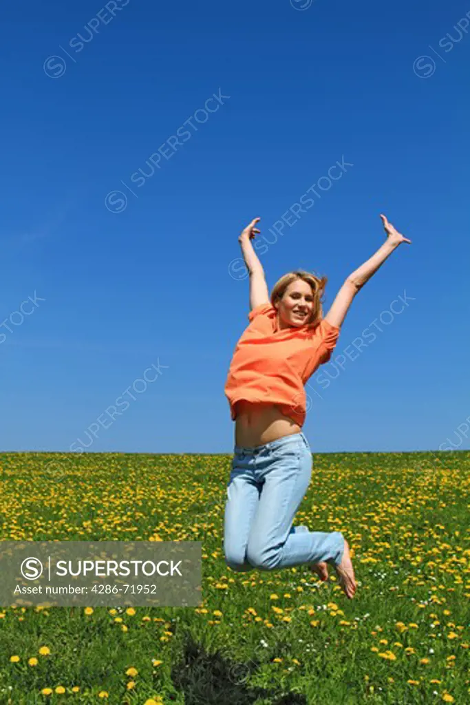 Happy young woman in spring