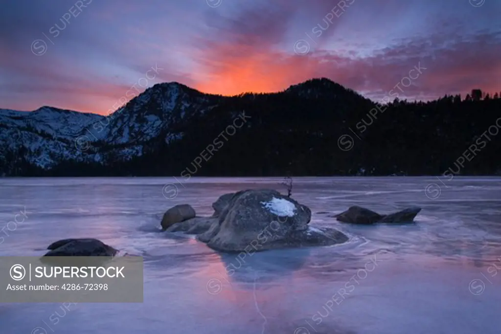 Sunset on frozen Cascade Lake near Lake Tahoe California